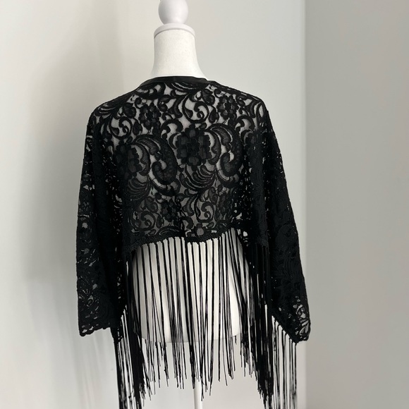 Complete Your  Look With This Chic Black Scarf - Picture 3 of 4